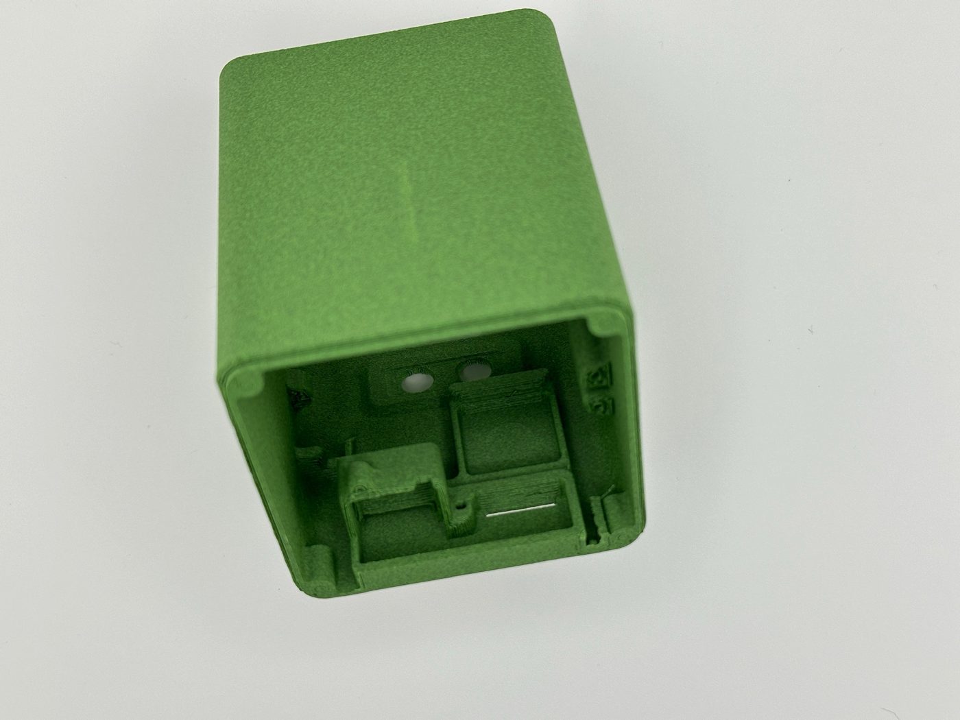 Green FDM 3D printed electronics enclosure with internal PCB mounting features