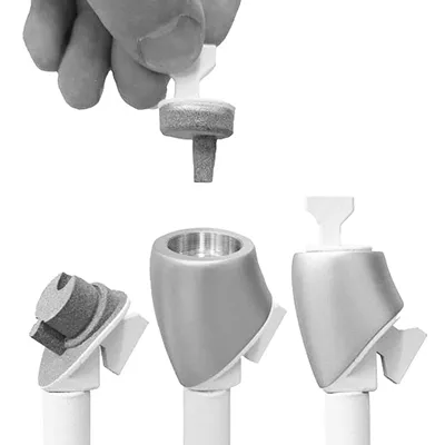 Three identical MJF 3D printed production fixtures showing repeatable quality for on-demand spare parts