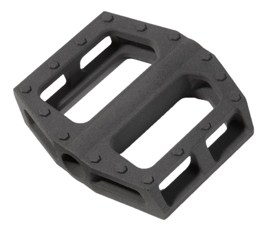 SLS 3D printed bike pedal in gray PA12 nylon showing matte powder-bed texture and open lattice structure