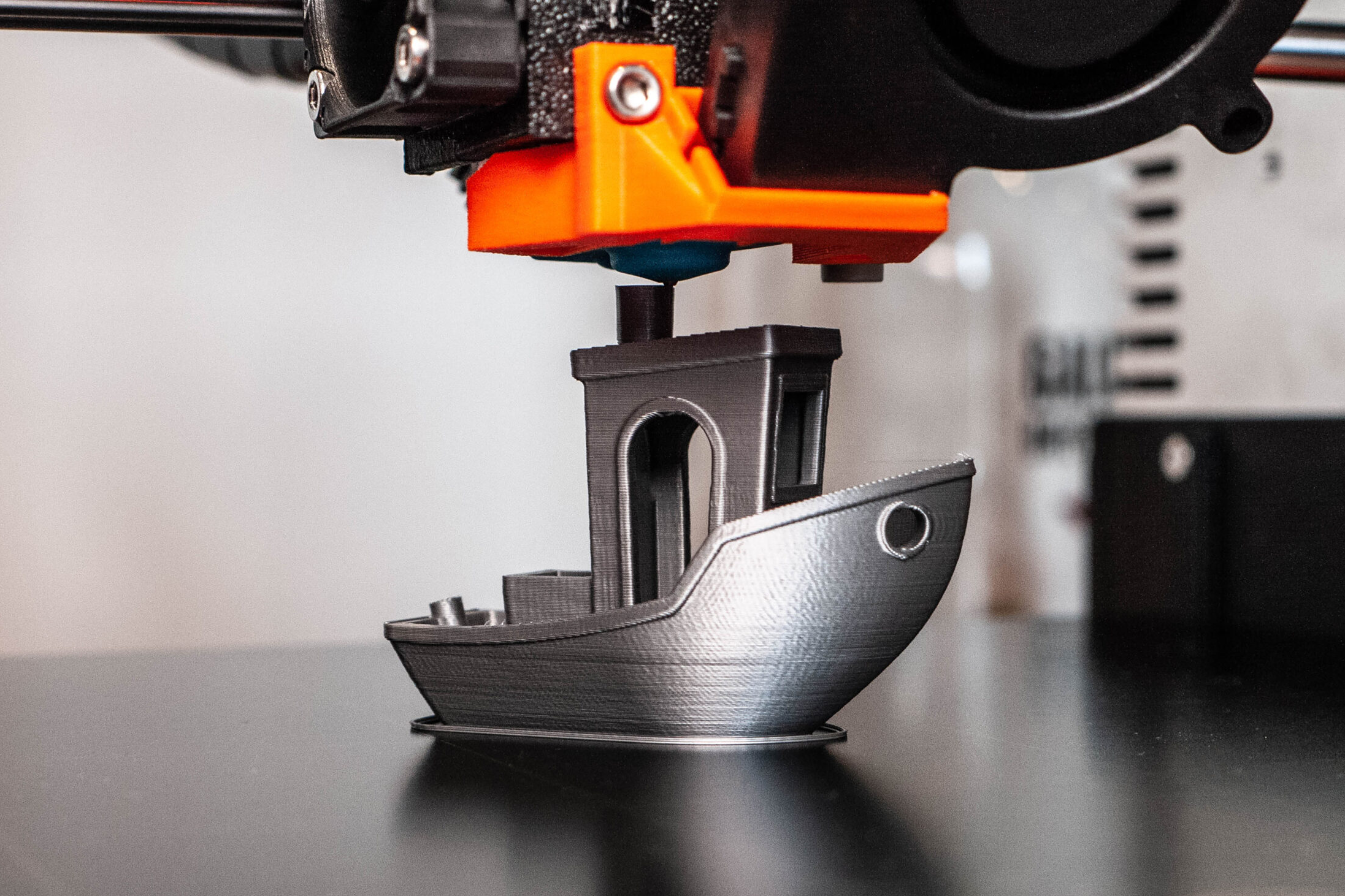 FDM 3D Printer printing a Benchy